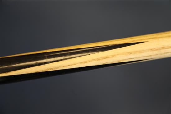 Walter Lindrum. An ash and ebonised snooker / billiards cue, 58.25in., together with a metal case